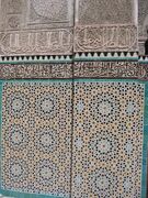 Tessellations: zellige mosaic tiles at Bou Inania Madrasa, Fes, Morocco