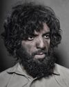 يعقوب الفرحان في لقطة من مسلسل العاصوف في دور جهيمان العتيبي.jpg
