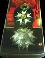 The insignia of a Grand Cross. Nowadays the star of a Grand Cross is gilt. The silver star is the Grand Officer's badge.