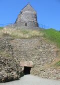 La Hougue Bie entrance and chapel, Jersey.jpg