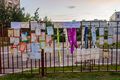 "Wall of shame" near a school with diplomas issued by the school, graduate sashes and protest inscriptions. Such installations were made in protest against presumable falsifications by the teachers[54]