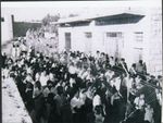 صورة لعرس في قرية بيت صفافا يظهر فيها الشريط الفاصل بين الأراضي التي احتلت في العام 1948 وتلك التي احتلت في العام 1967.