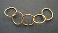 Five interconnecting golden rings