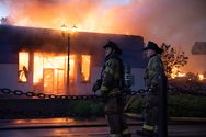 Firefighters observing the damage in Minneapolis the afternoon of May 28, 2020