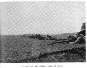 Line of dismounted soldiers with bayonets attached to rifles in the firing line
