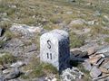 إيطاليا/Switzerland border stone at Passo San Giacomo. Some borders were broadly defined by treaty, and surveyors would then choose a suitable line on the ground.