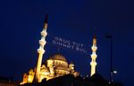 A mahya reading "Hold the fast. find good health" hangs between the minarets of the Ottoman-era Eminonu New Mosque in Istanbul August 12, 2010. Mahya, where dangling lights suspended between minarets spell out devotional messages in huge letters, are intended to reward and inspire the faithful who have spent the daylight hours fasting. Today just a handful of Istanbul's mosques use Mahya, the phrases dictated by Turkey's directorate of religious affairs. (REUTERS/Murad Sezer)