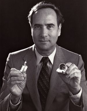 Ted Maiman Holding First Laser.jpg