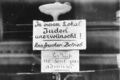"Jews not admitted here". Sign outside a restaurant in Paris, rue de Choiseul.