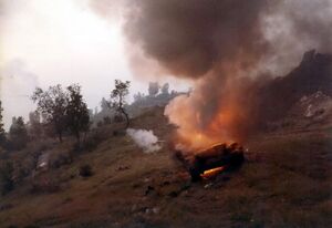 Syrian Tank burning in Tzuk Track.jpg