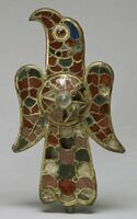 Visigothic 6th-century eagle-fibula, from Spain with garnets, amethysts, and colored glass, and some cloisons now empty.