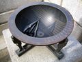 A modern hemispherium in Gyeongbok Palace in Seoul, South Korea. 37°34′43″N 126°58′38″E﻿ / ﻿37.578611°N 126.977222°E﻿ / 37.578611; 126.977222﻿ (Gyeongbok Palace hemispherium) The tip of the pointer serves as the nodus; the height of the nodus-shadow within the bowl gives the time of the year. Since the picture was taken on 24 November, the sun is low in the sky, and the nodus-shadow higher in the bowl.