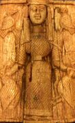 Artemis Orthia in the usual stance of Potnia Theron on an archaic ivory votive offering, (National Archaeological Museum of Athens)