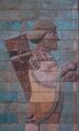 Terra-cotta frieze of the Apadana of Susa, depicting an Achaemenid soldier. Note the intricate clothing details, and lively coloration of the piece