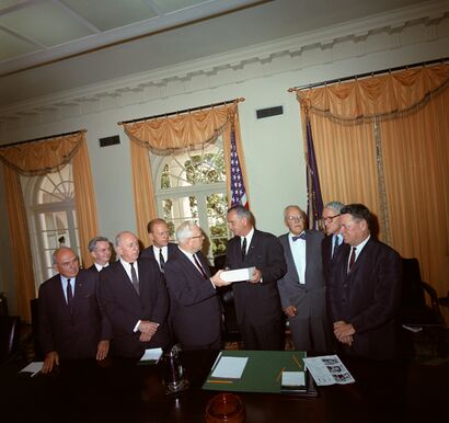 Members of the Warren Commission present their report to President Johnson