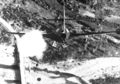 Lt. R. P. Yeatman, from the USS Bon Homme Richard, is shown rocketing and bombing Korean bridge. November 1952. (U.S. Navy)