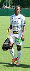 Faith Ikidi, an example of a "lean and muscular" women's association football player]]